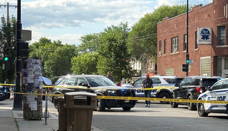 Law enforcement vehicles gathered in an intersection in Madison following a fatal police shooting on Wednesday, July 22, 2026.