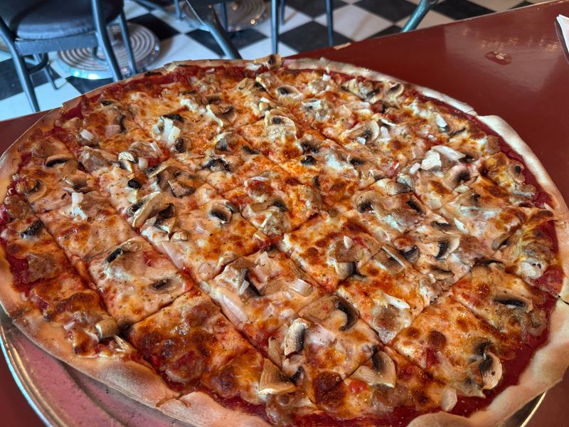 Caradaro Club was the first place to serve pizza in Milwaukee, and is the ancestor to legendary spots like Balistreri's and Calderone Club.
