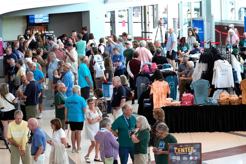 People gather before the start of the First Songs event kicking off the 13th annual Mile of Music festival Wednesday, July 29, 2026, at the Fox Cities Performing Arts Center in downtown Appleton, Wisconsin.