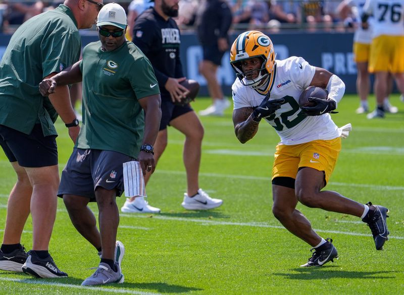 Green Bay Packers running back MarShawn Lloyd (32) runs through a drill during the second day of training camp Thursday, July 30, 2026, at the Don Hutson Center in Ashwaubenon, Wisconsin.