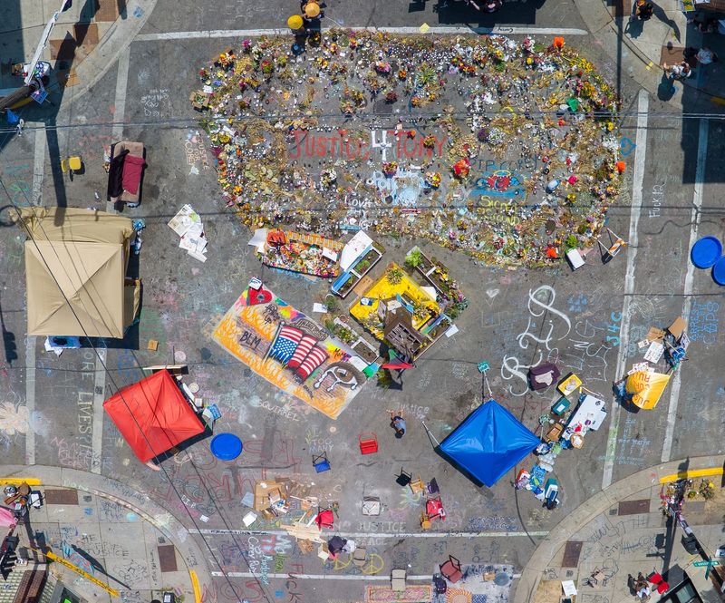 Memorials for Corey Ruiz, 38, are shown at an encampment Thursday, July 30, 2026, in Madison, Wisconsin. Ruiz was shot and killed by Madison police on July 22 while armed with a knife during an attempt to restrain him. The shooting sparked waves of protests.