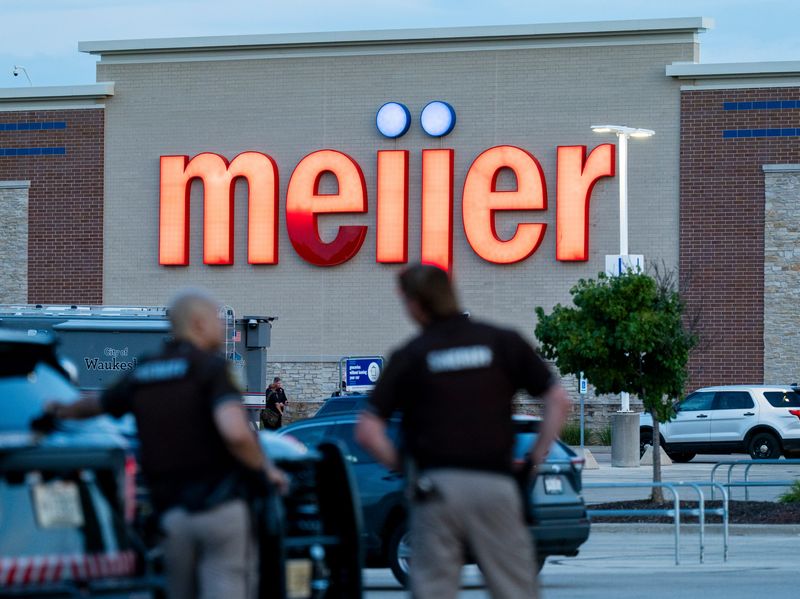 Waukesha County sheriff officers are seen blocking the entrance to the parking lot of the Meijer store in Waukesha, Wisconsin on July 30, 2026.