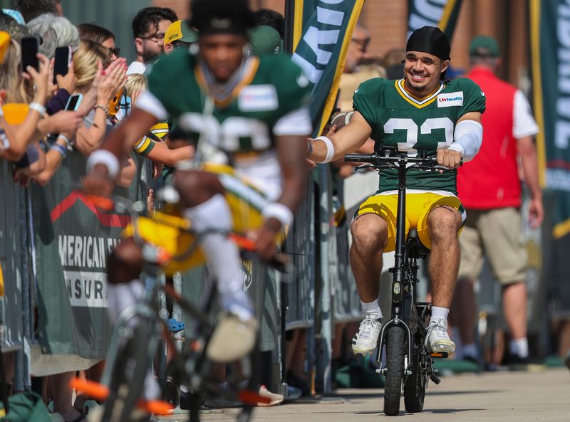Green Bay Packers safety Evan Williams (33) rides a bicycle to practice on Monday, Aug. 3, 2026, at Lambeau Field in Green Bay, Wisconsin. 
Tork Mason/USA TODAY NETWORK-Wisconsin
