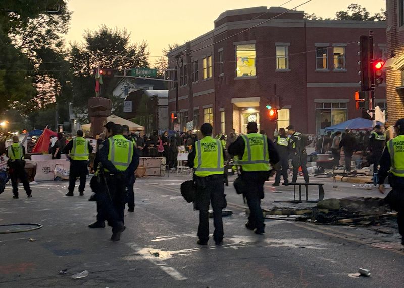 Police and officials remove the Corey Ruiz protest encampment in Madison, Wisconsin on August 4, 2026.