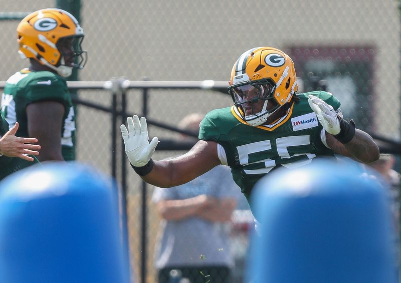 Packers defensive lineman Chris McClellan (55) runs through a drill during an August practice at Ray Nitschke Field.