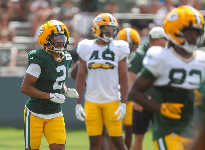 Packers cornerback Brandon Cisse (2) returns to the huddle after finishing a rep during practice Aug. 4 at Ray Nitschke Field.
