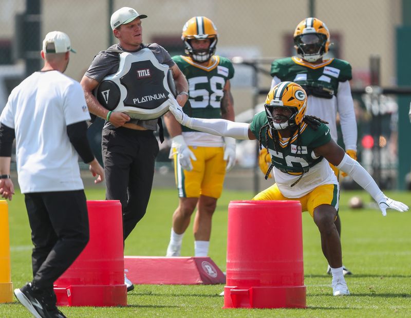 Green Bay Packers linebacker Ty'Ron Hopper (59) runs through a drill during practice on Tuesday, Aug. 4, 2026, at Ray Nitschke Field in Ashwaubenon, Wisconsin. 
Tork Mason/USA TODAY NETWORK-Wisconsin