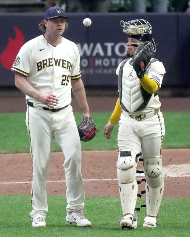 Milwaukee Brewers pitcher Trevor Megill (29) reacts after the the final out during their game against the Pittsburgh Pirates Wednesday, August 5, 2026 at American Family Field in Milwaukee, Wisconsin. Also shown is catcher William Contreras (24).