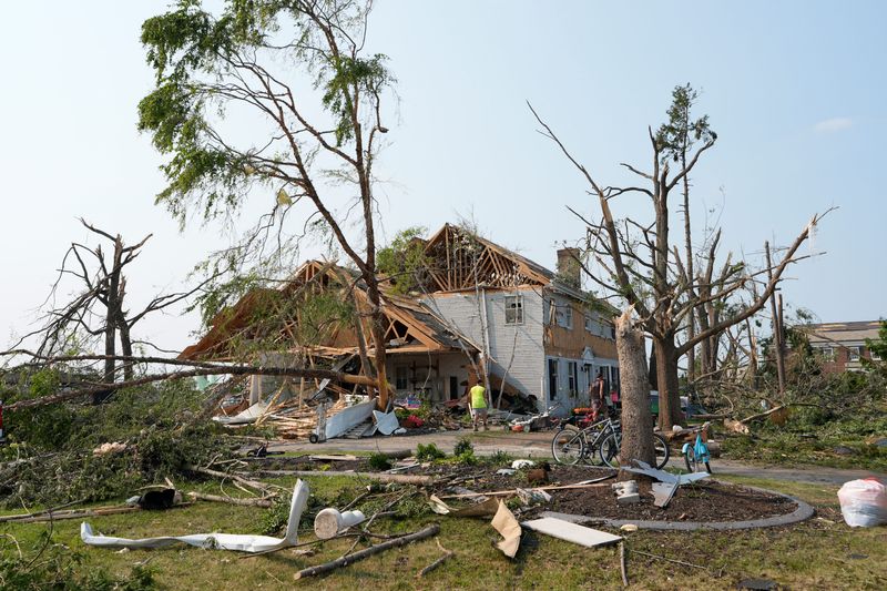 Clean up continues Tuesday, July 28, 2026, at Doty Island in Menasha, Wisconsin, after an estimated EF3 tornado tore through the area July 27.
