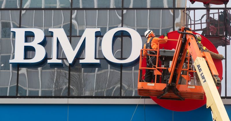 Workers from Lemberg Electric Co. attach signage to the under-construction 25-story BMO Tower Thursday March 5, 2020 at the corner of E. Wells St. and N. Water St. in Milwaukee, Wis. It will be anchored by BMO Harris Bank's Wisconsin headquarters.