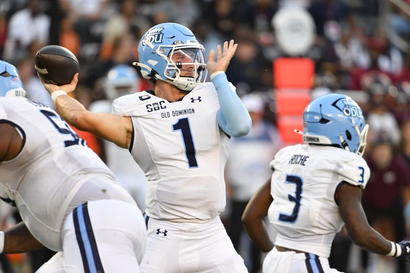 Sep 13, 2025; Blacksburg, Virginia, USA;  Old Dominion Monarchs quarterback Colton Joseph (1) throws a pass during the first quarter at Lane Stadium. Mandatory Credit: Brian Bishop-Imagn Images
