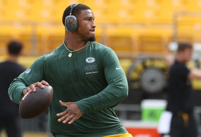 Aug 13, 2026; Pittsburgh, Pennsylvania, USA;  Green Bay Packers quarterback Kyron Drones (13) throws on the field before the game against the Pittsburgh Steelers at Acrisure Stadium. Mandatory Credit: Charles LeClaire-Imagn Images
