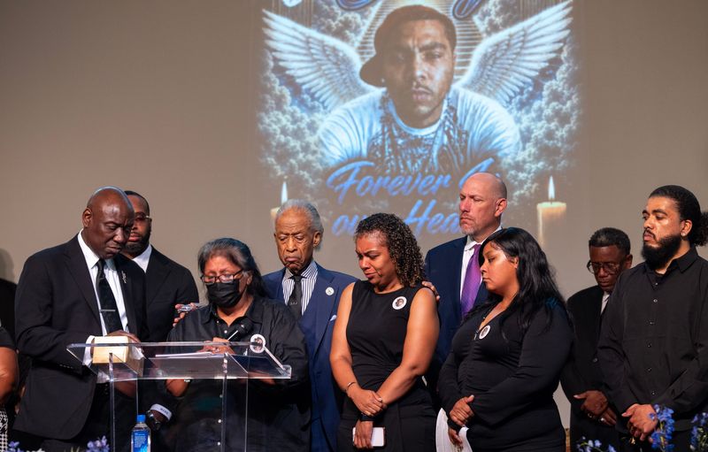 Elsa Ruiz speaks at the funeral for her son, Corey Ruiz, Friday, August 14, 2026 at the Fountain of Life Church in Madison, Wisconsin. Ruiz was shot and killed by a Madison Police officer following an altercation during an attempted arrest in July. She is flanked by attorney Ben Crump, left, and civil rights leader Rev. Al Sharpton.