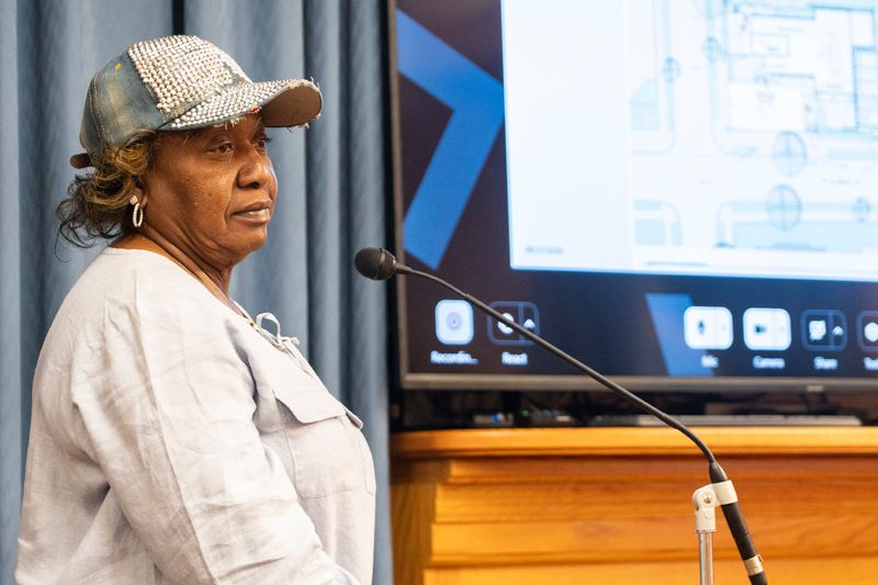 Metcalfe Park resident Sheila Milton conveys her support for a proposed zoning change ordinance during a City Planning Commission meeting at City Hall on Aug. 17, 2026, in Milwaukee, Wisconsin. The zoning change ordinance would allow the Metcalfe Park Liberation Hub to be a mixed-use development, which would include commercial and residential uses.