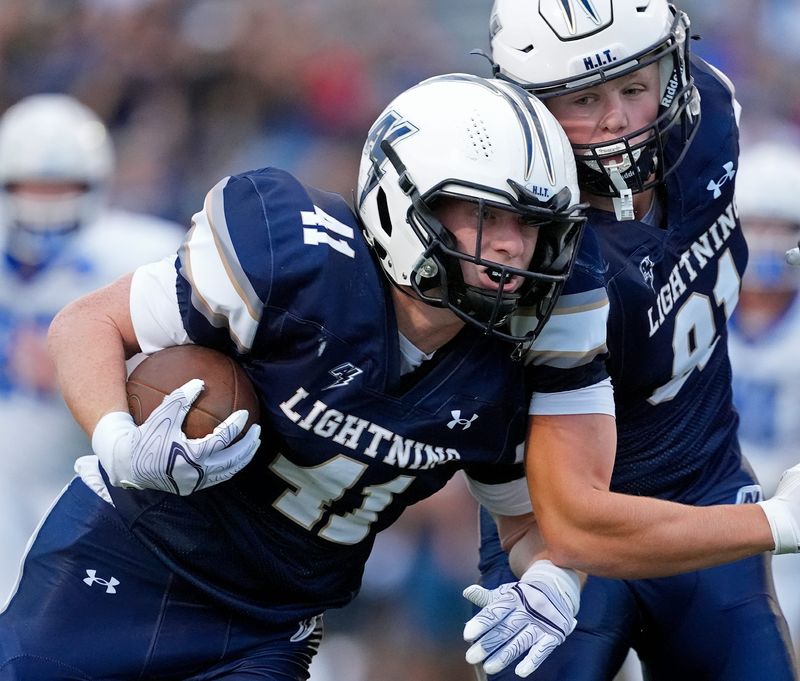 Appleton North High School’s Finely Sheridan (41) crosses the goal line against Mukwonago High School during their football game Thursday, August 20, in Appleton, Wisconsin. Appleton defeated Muckwonago 10-7.
Wm. Glasheen USA TODAY NETWORK-Wisconsin