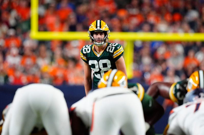 Aug 21, 2026; Denver, Colorado, USA;  Green Bay Packers kicker Trey Smack (28) lines up a field kick during the second quarter of a preseason game against the Denver Broncos at Empower Field at Mile High.  Mandatory Credit: Ron Chenoy-Imagn Images