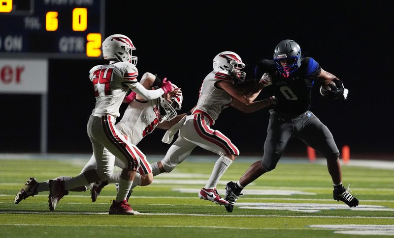 Green Bay Southwest running back Traevaughn Weaver (0) had 201 yards and three touchdowns against Sheboygan South.