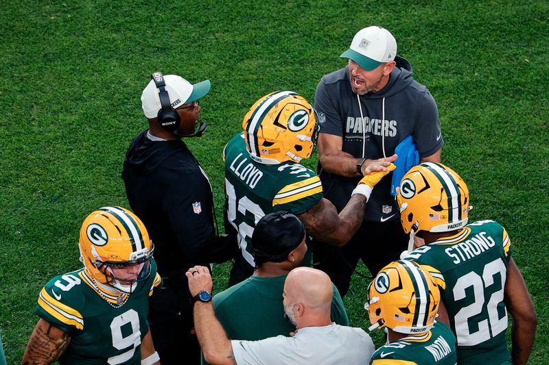 Aug 21, 2026; Denver, Colorado, USA; Green Bay Packers head coach Matt LaFleur celebrates the touchdown of running back Marshawn Lloyd (32) in the first quarter against the Denver Broncos at Empower Field at Mile High. Mandatory Credit: Isaiah J. Downing-Imagn Images